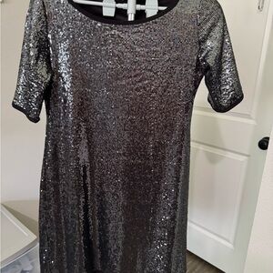 Tiana B. Black Shiny sequined T-shirt mini dress